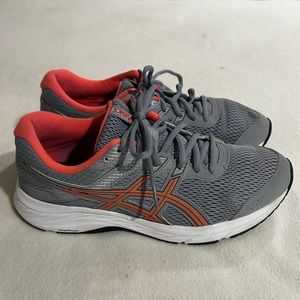 ASICS women’s size 10 gray and orange shoes.